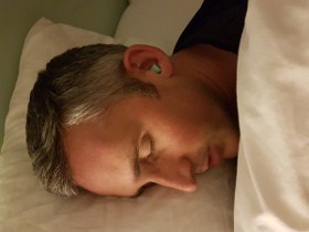 photo of me wearing earplugs in bed