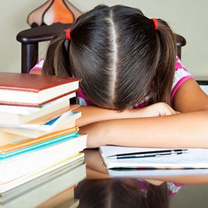 someone sleeping on books