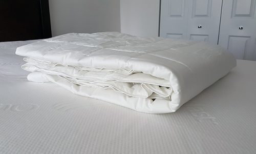 slumbercloud comforter set up on my bed