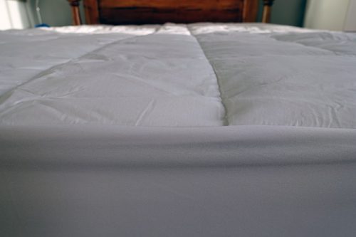 slumbercloud mattress pad on bed