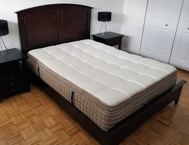 Dreamcloud mattress on a bed frame