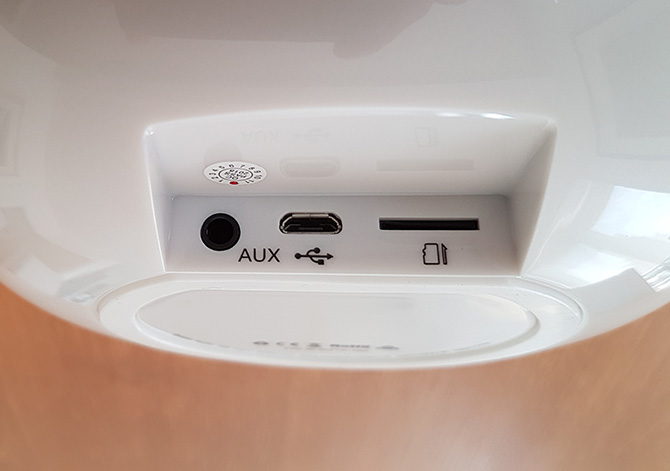 photo of the audio in, usb charging port and microsd slot for the mifa sound machine