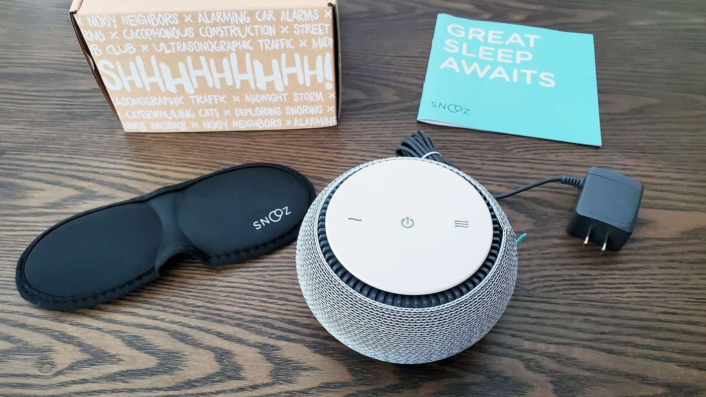 Snooz white noise machine with the original box, manual, and cable