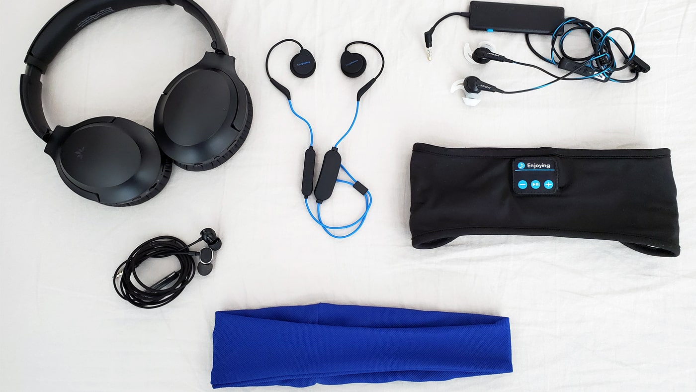 six pairs of headphones, including the Sleepphones