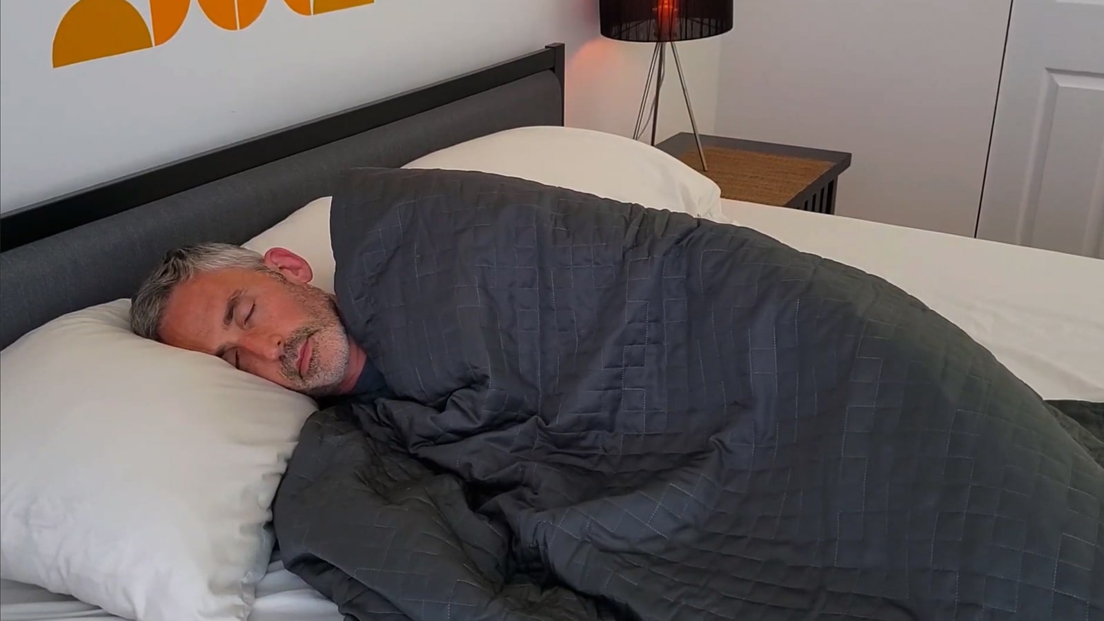 man using the Gravity cooling blanket