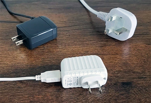 three examples of white noise machine plugs and cables