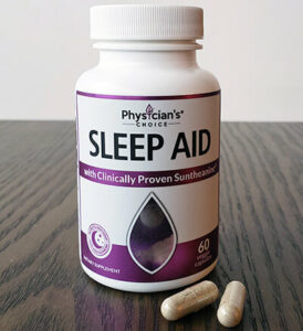 bottle of physician's choice sleep aid and two capsules