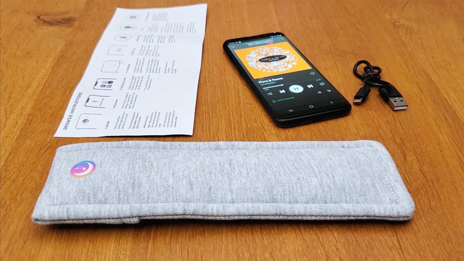 Drowsie pillow speaker with a phone playing audio