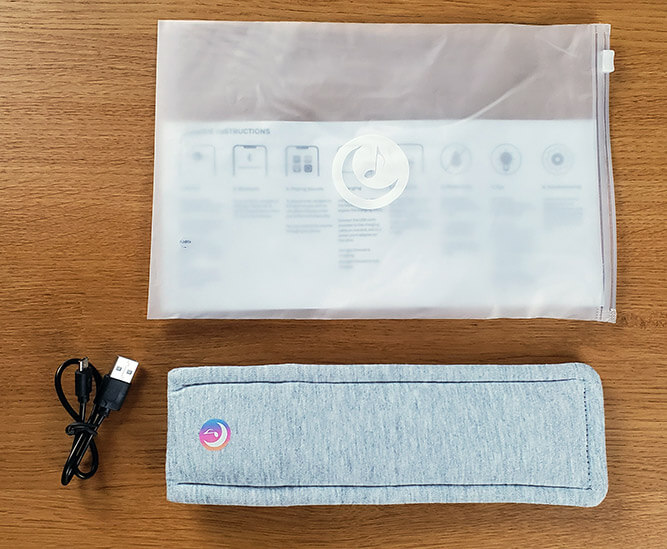 Drowsie pillow speaker with the original packaging and charging cable