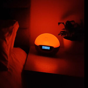 photo of the lumie bodyclock shine 300 on a deep red sunset setting