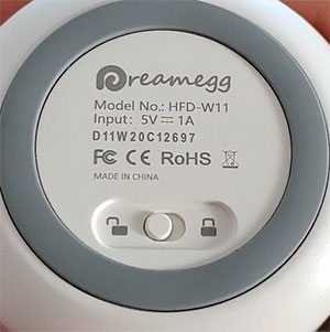 underside of the dreamegg d11 sound machine showing the lock button and the model number