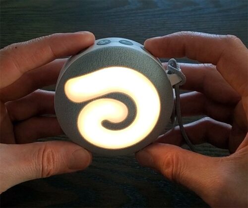 dreamegg d11 sound machine with the nightlight turned on