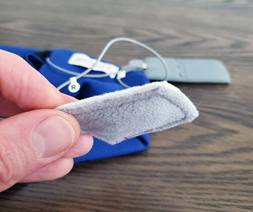 photo of a hand holding one of the sleepphones internal padded speakers