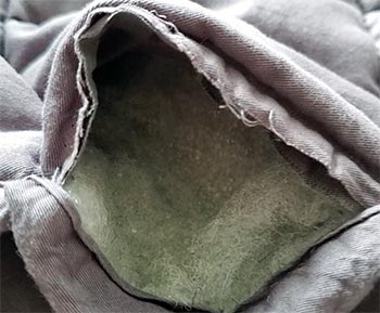 Close up photo of the inside of a weight blanket pocket