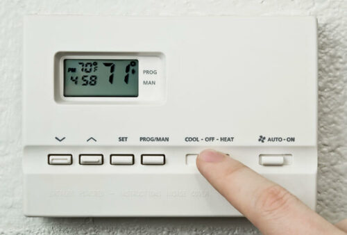 photo of a thermostat set to 71 degrees Fahrenheit