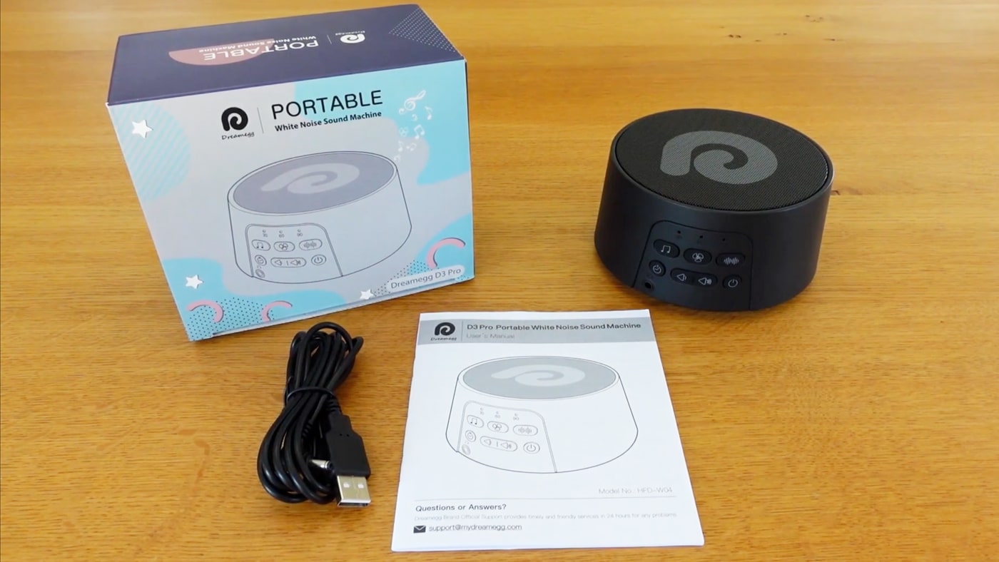 Dreamegg d3 pro white noise machine, box, charging cable and instruction manual.