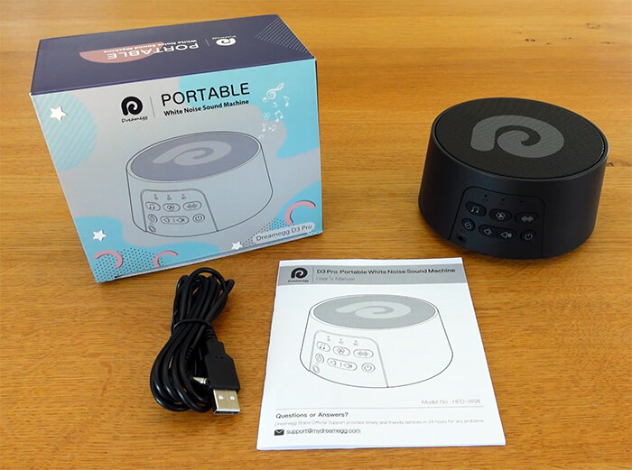 photo of the dreamegg d3 pro, the box, charging cable and instruction manual