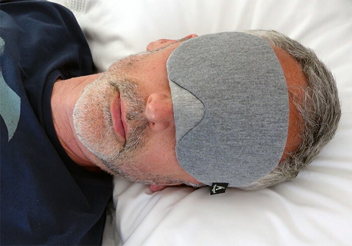 man wearing the Mavogel cotton sleep mask