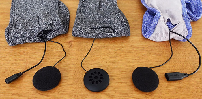 three sets of sleep headphones headband style, with the speakers removed to show their size