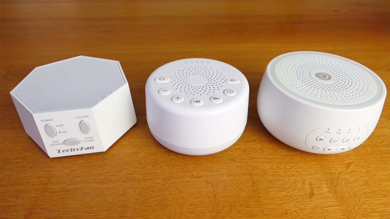 photo of the Easysleep, Lectrofan Classic and Yogasleep Dreamcenter white noise machines side by side