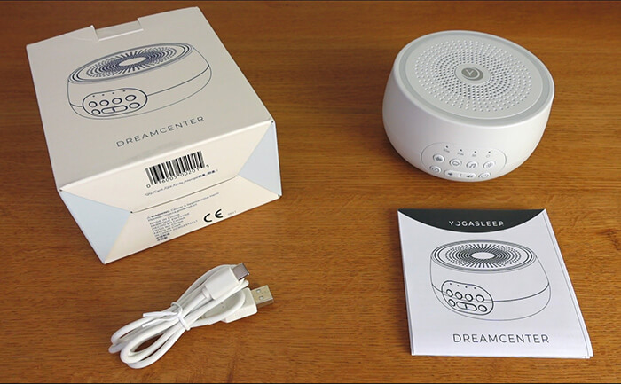 photo of the Yogasleep Dreamcenter, the box, manual, and cable