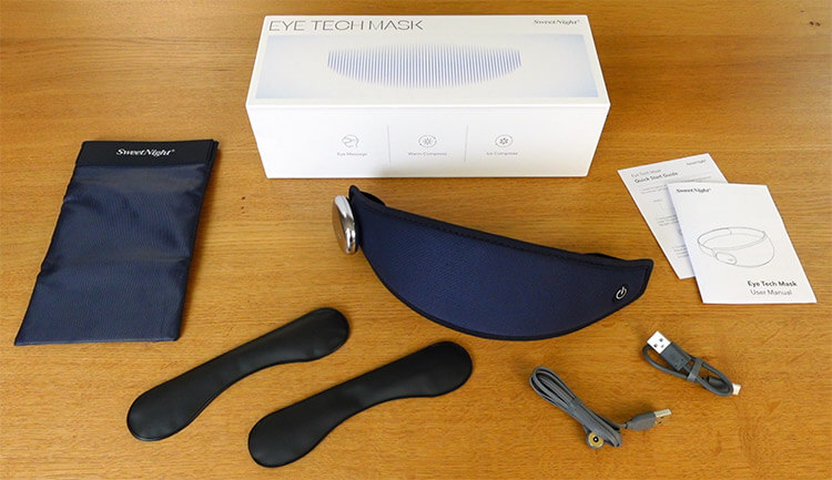 photo of the Sweetnight Eye Tech Mask parts: the mask, box, charging cables, battery, user guide, carry bag, and gel packs