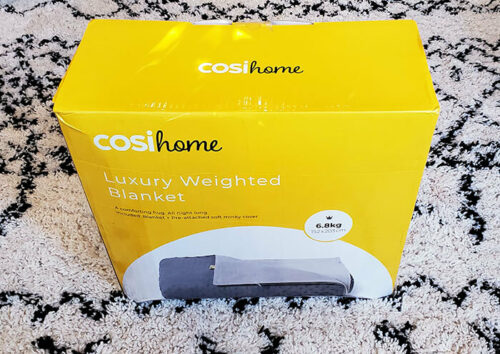 photo of the Cosi Home weighted blanket in its original box