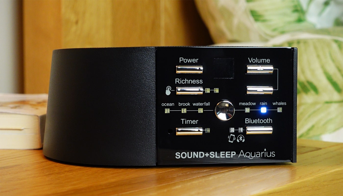 Sound+Sleep Aquarius white noise machine on a bedside table