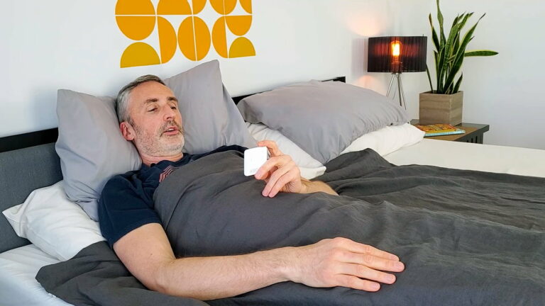 man in bed With a weighted blanket