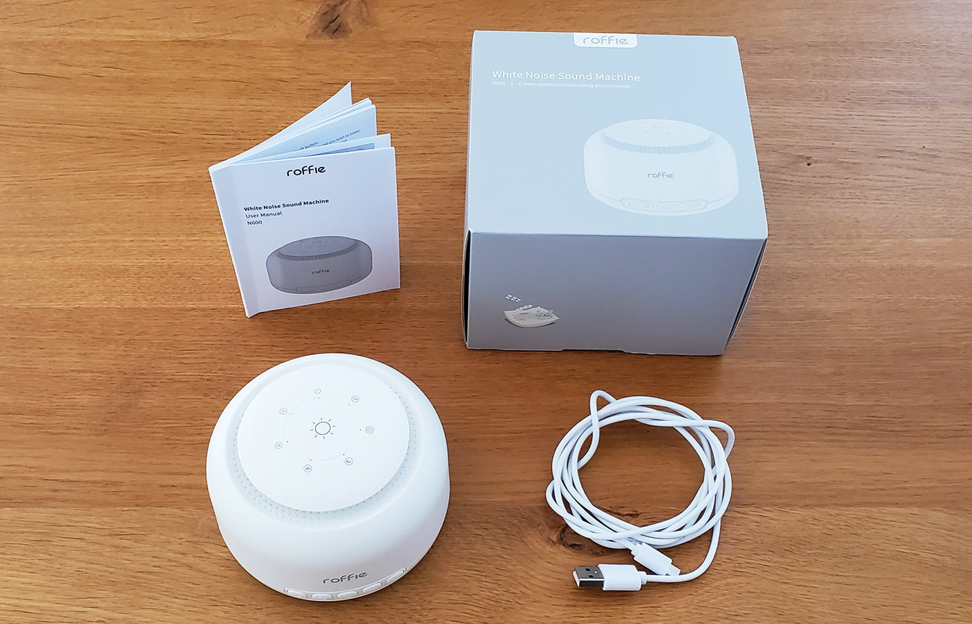 Roffie white noise machine, box, power cable, and instructions.