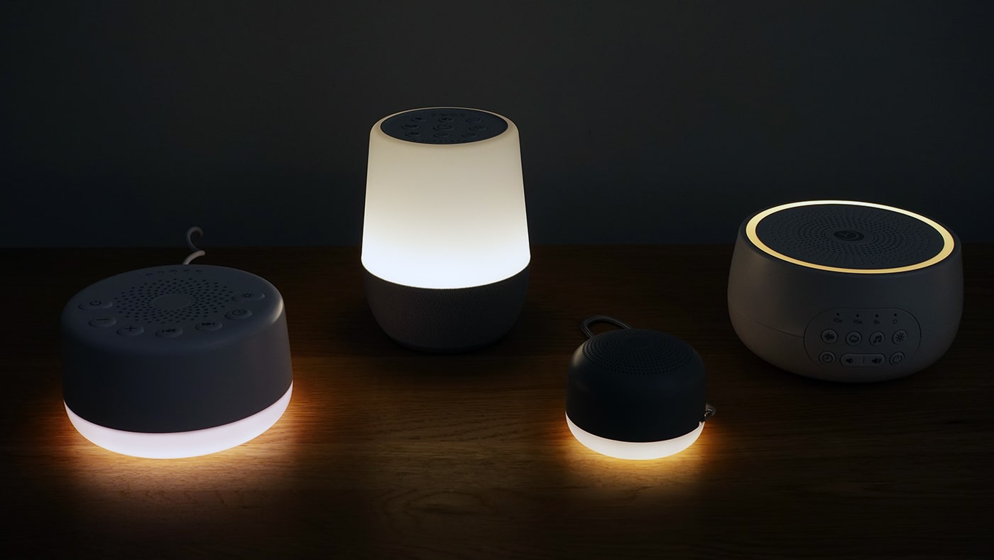 four white noise machines with a nightlight