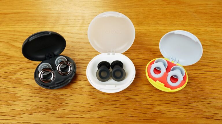 Loop Dream, Quiet 2, Experience 2 Plus earplugs in their carry cases on a table