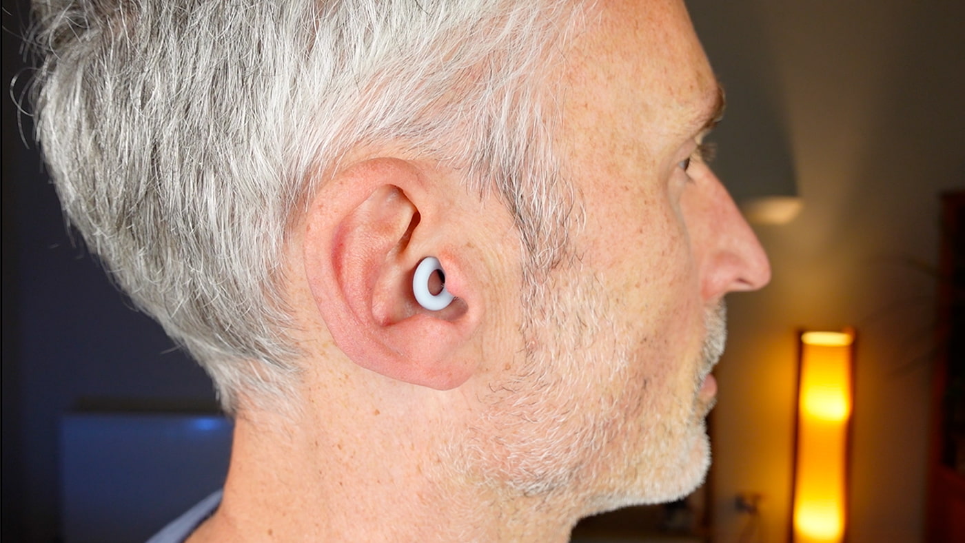 man wearing Loop Quiet 2 earplugs