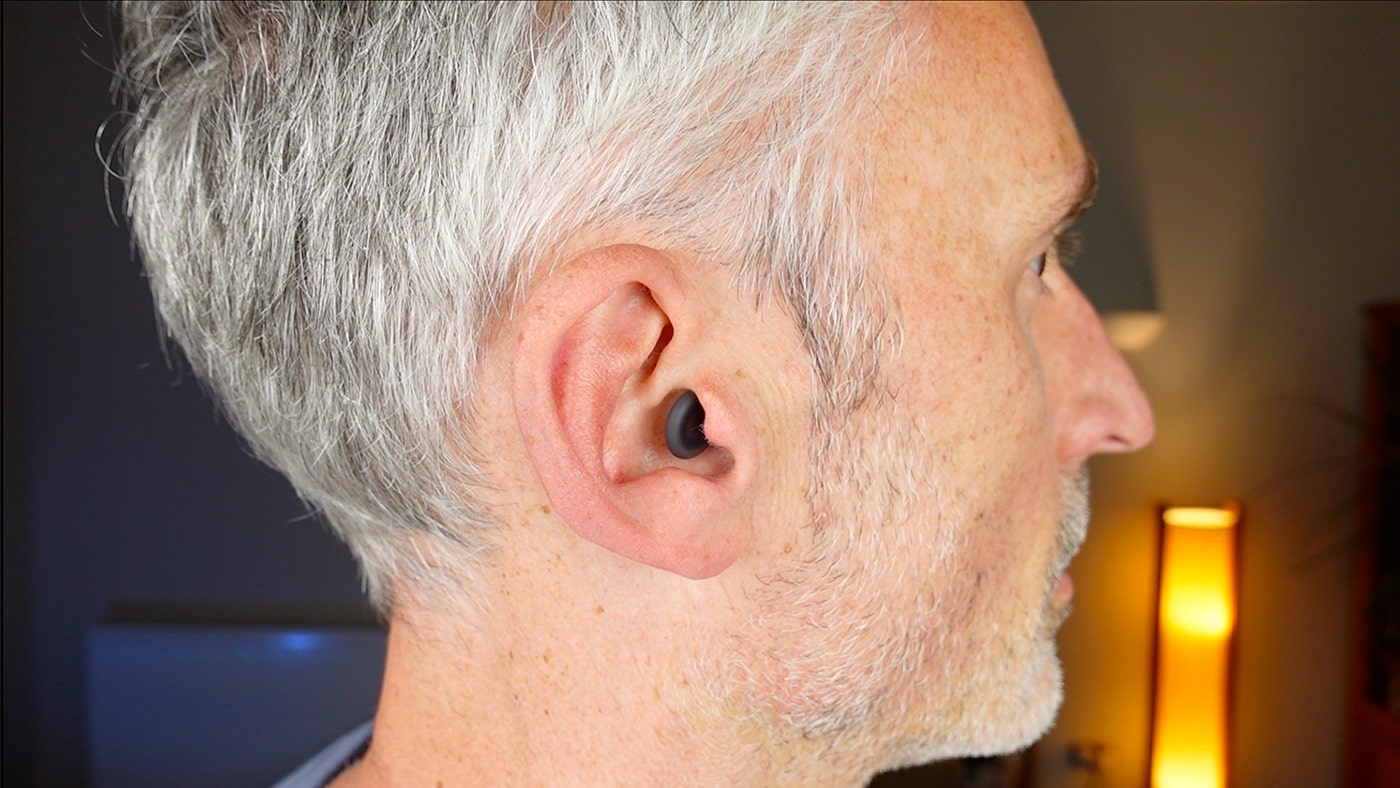 man wearing Loop Dream earplugs