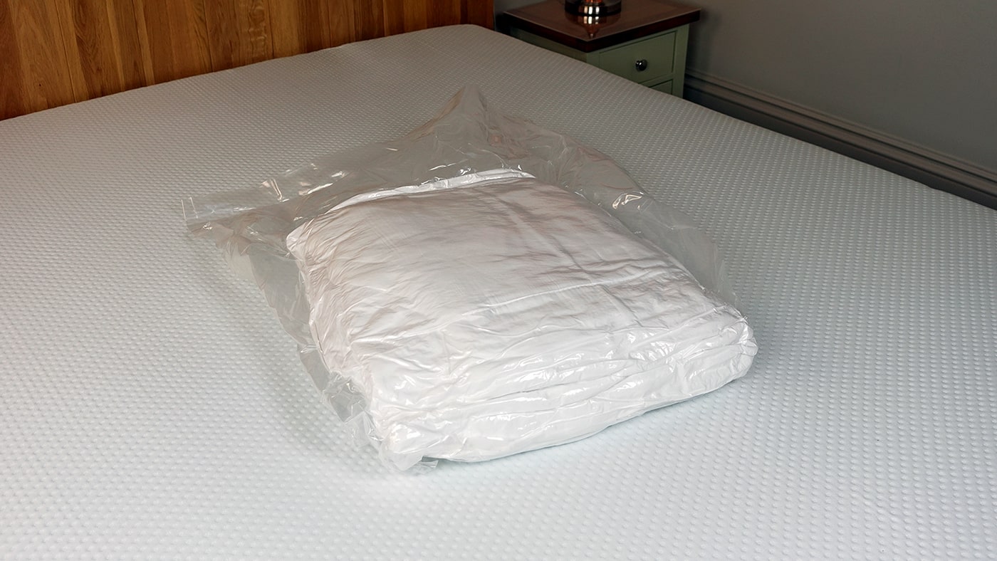 MightySoft mattress topper shrink wrapped in the original bag