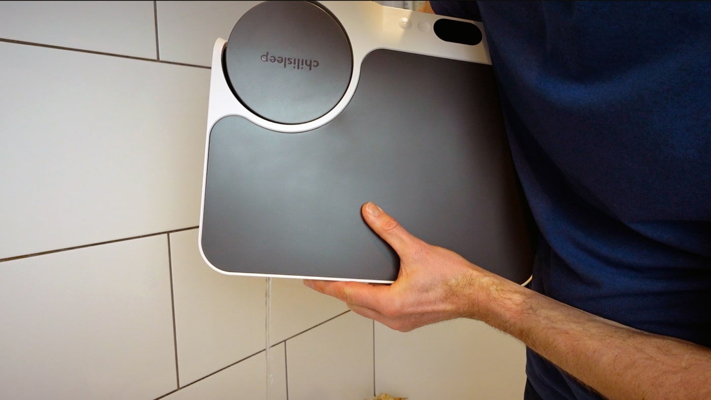 man draining the chilipad dock pro control unit