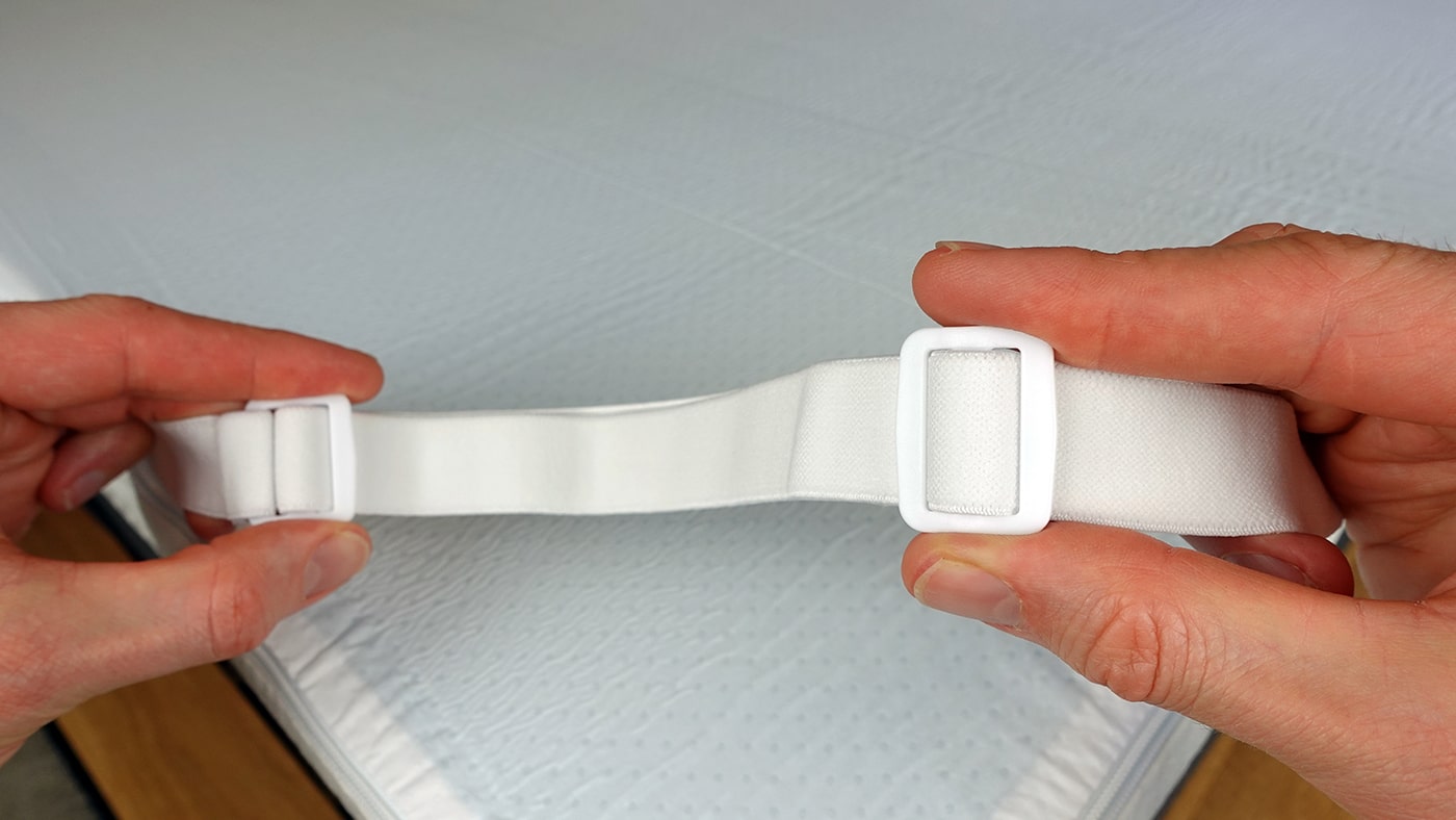 Panda mattress topper corner strap close up