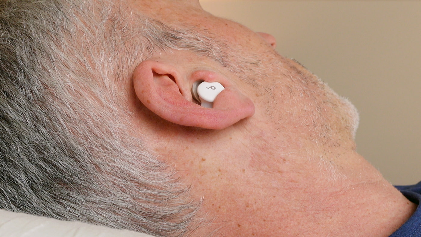 man wearing Soundcore Sleep A30 headphones