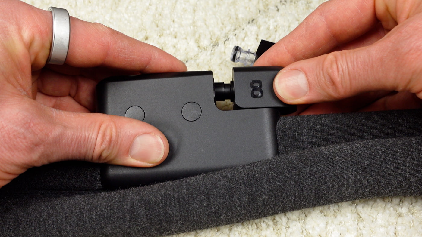 person changing the Eight Sleep Pod 5 maintenance insert