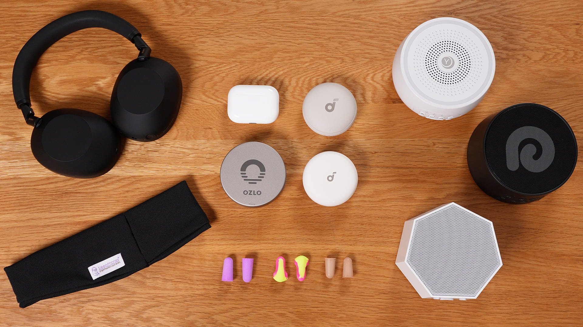 selection of earplugs, headphones, and white noise machines