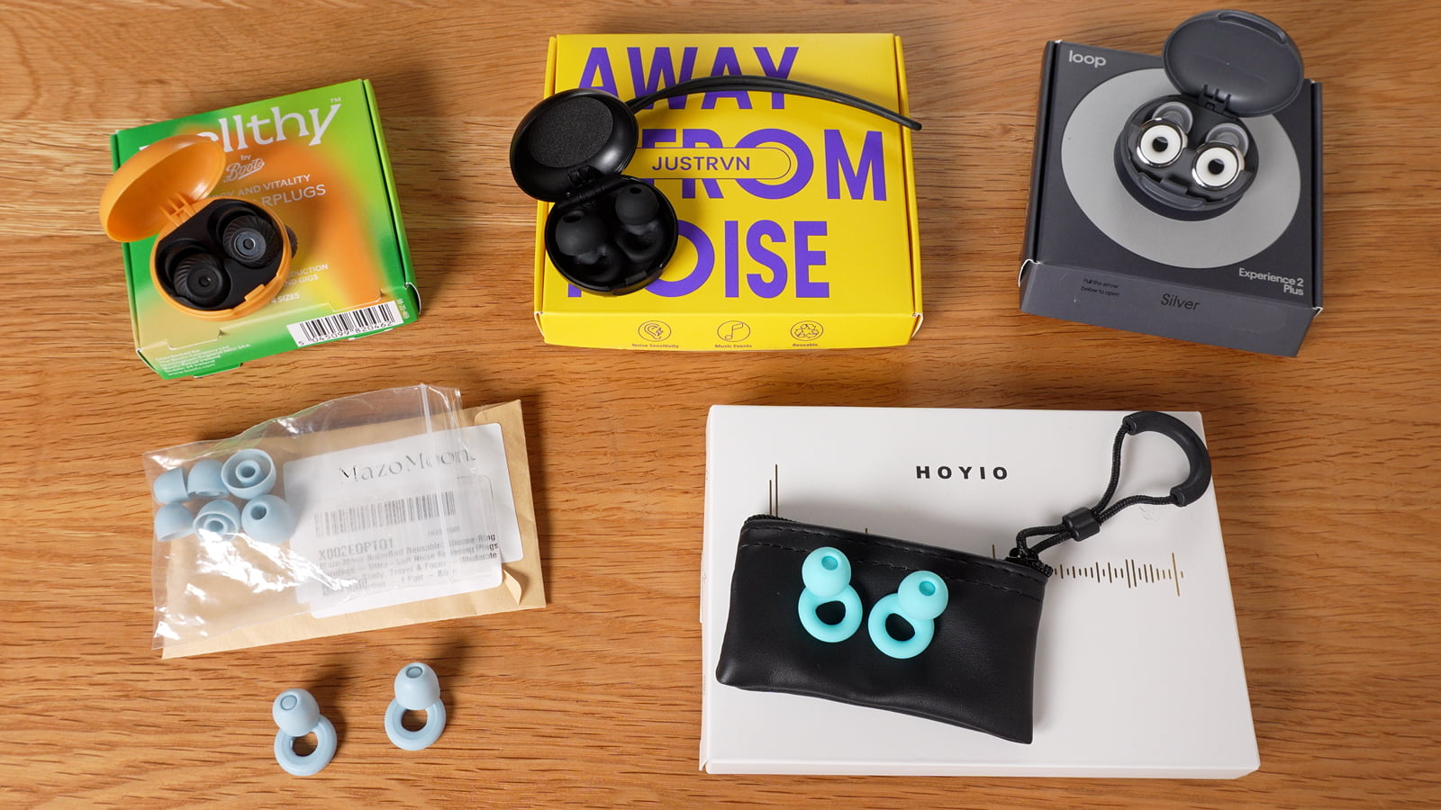 5 pairs of earplugs and their boxes: Mazo Moon, Loop Experience 2 Plus, Hoyio, Justrvn, Boots Wellthy Party Earplugs.